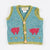 Handknitted Baby Waistcoat - Sea Blue with Pig motif
